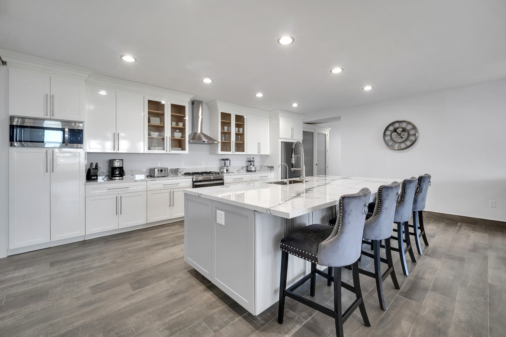 Private chef's kitchen with marble island