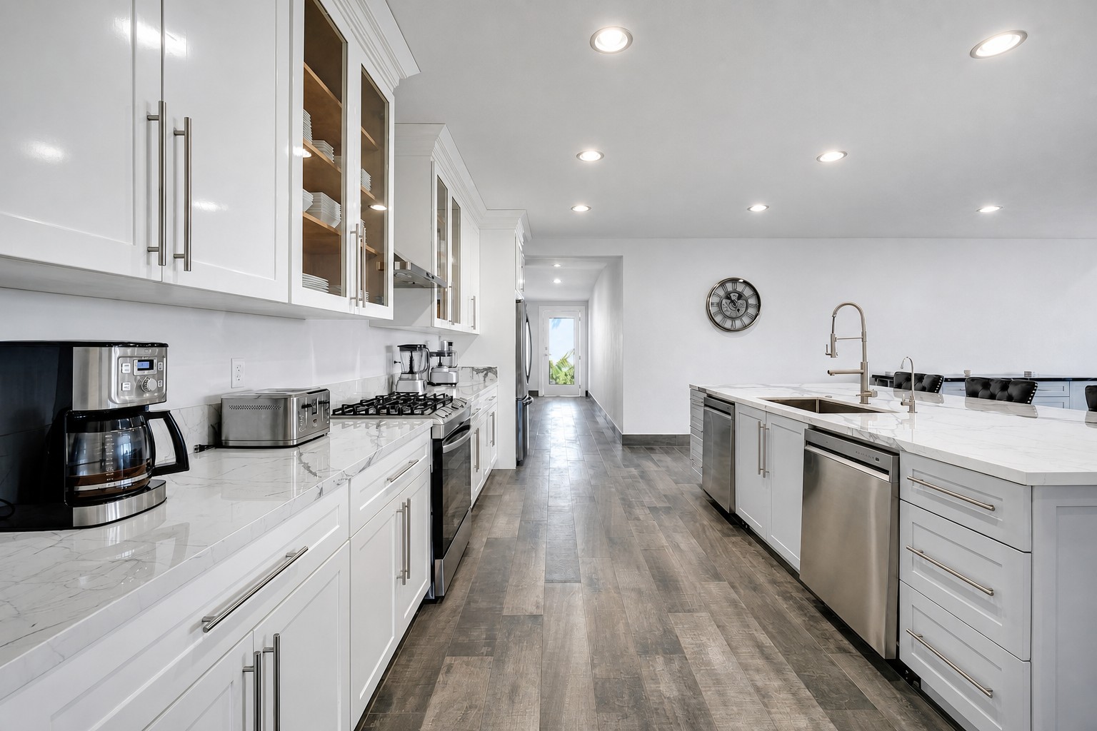 Chef-quality kitchen with marble counters and stainless appliances