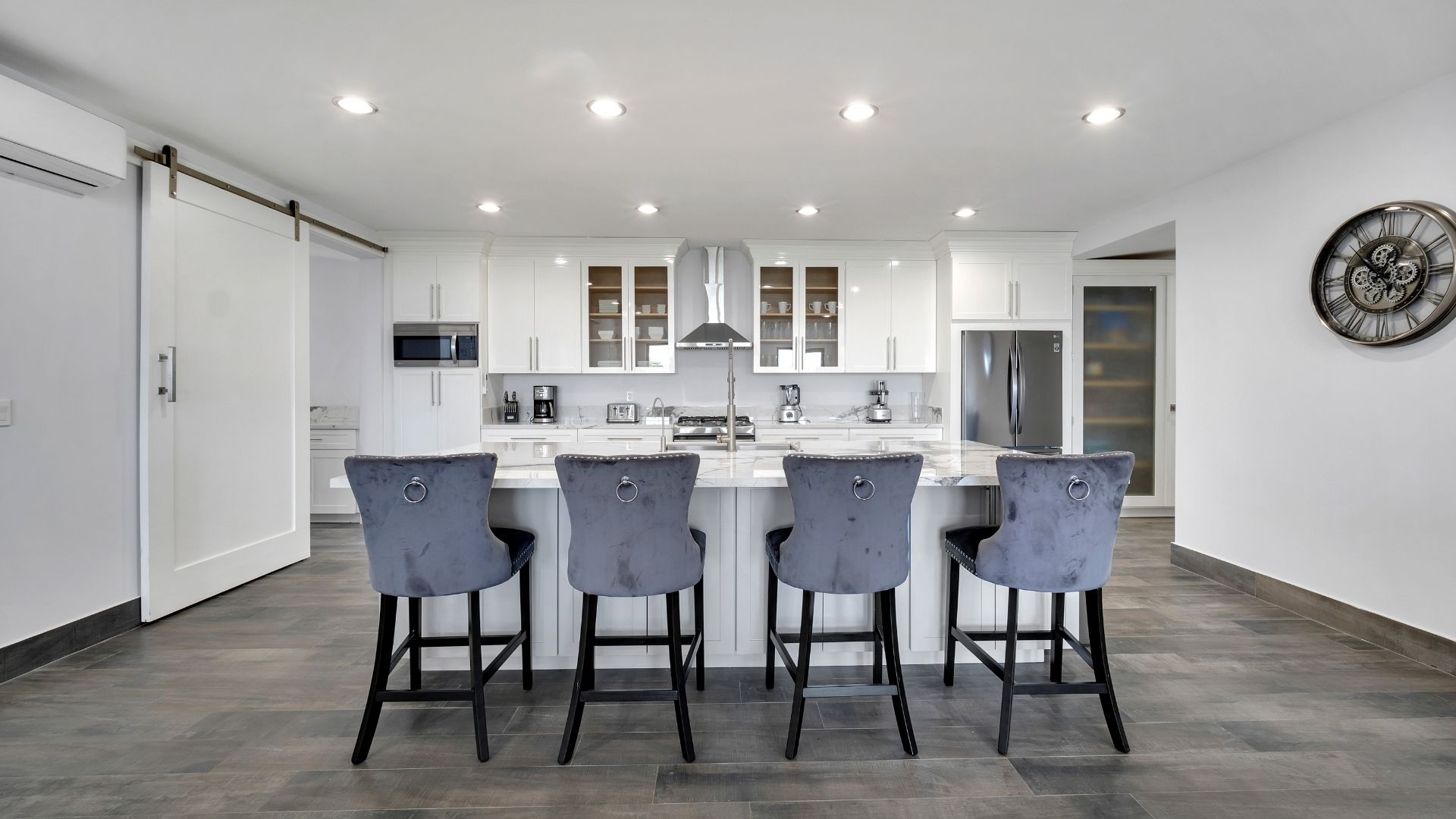 Chef's kitchen bar with velvet stools