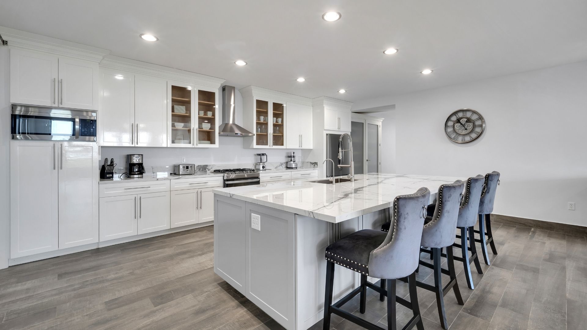 Private chef's kitchen with marble island